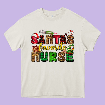 Santas Favorite Nurse Heavy Core Tee Designed By Adodesignshop