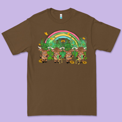 St Patrick's Day Baby Highland Cow Premium Tee Designed By Maliassmallbusiness