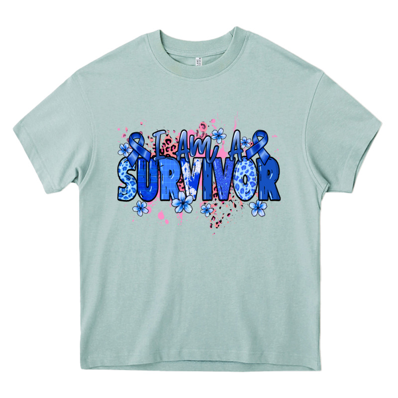 I Am A Survivor Colon Cancer Blue Ribbon Heavy Core Tee by NancyCooperArtShop | Teevron