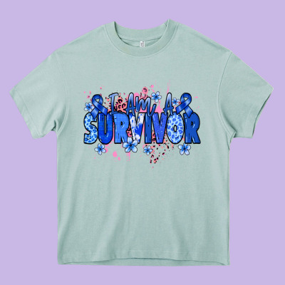 I Am A Survivor Colon Cancer Blue Ribbon Heavy Core Tee Designed By Nancycooperartshop