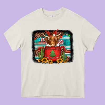 Hot Coco Christmas Highland Cow With Background Heavy Core Tee Designed By Jasminsmagicworld