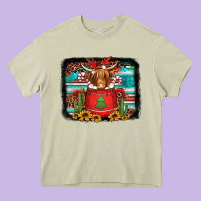 Hot Coco Christmas Highland Cow With Background Heavy Core Tee Designed By Jasminsmagicworld