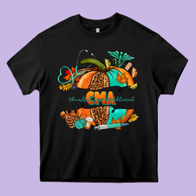 Cma Pumpkin Nurse Heavy Core Tee Designed By Nancycooperartshop