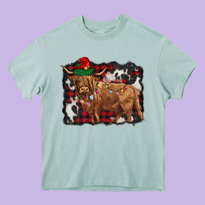 Christmas Highland Cow Heavy Core Tee Designed By Barkaloodesign
