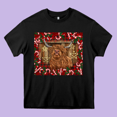 Christmas Highland Cow With Candy Canes Heavy Core Tee Designed By Barkaloodesign