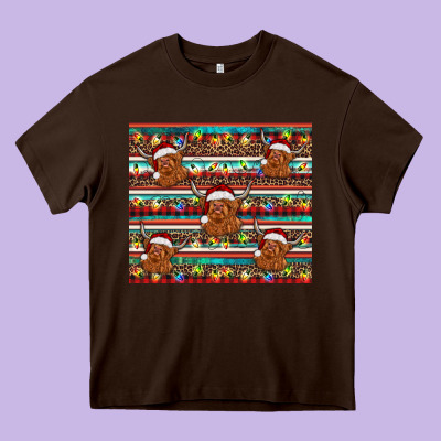 Christmas Turquoise Serape Highland Cow Heavy Core Tee Designed By Barkaloodesign