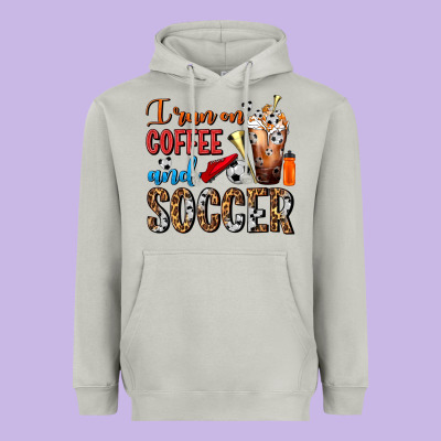 I Run On Coffee And Soccer Frappe Heavyweight Hoodie Designed By Fadigitalartstudio