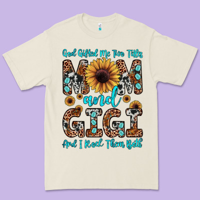 God Gifted Me Two Titles Mom And Gigi  And I Rock Them Both Premium Tee Designed By Jahusdesignshop