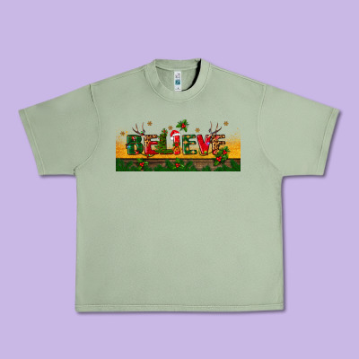 Christmas Believe Urban Heavy Tee Designed By Bundleandbundleshop