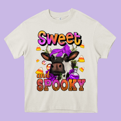 Sweet And Spooky Halloween Cow Heavy Core Tee Designed By Jasminsmagicworld