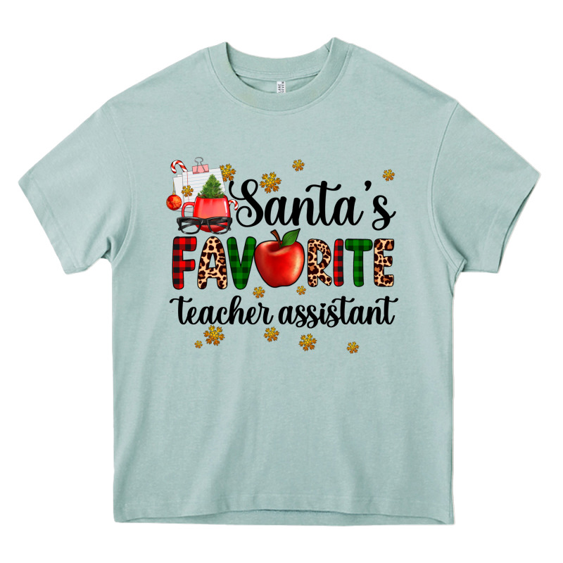 Santa's Favorite Teacher Assistant Heavy Core Tee by AdoDesignShop | Teevron