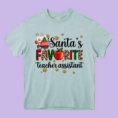 Santa's Favorite Teacher Assistant Heavy Core Tee Designed By Adodesignshop