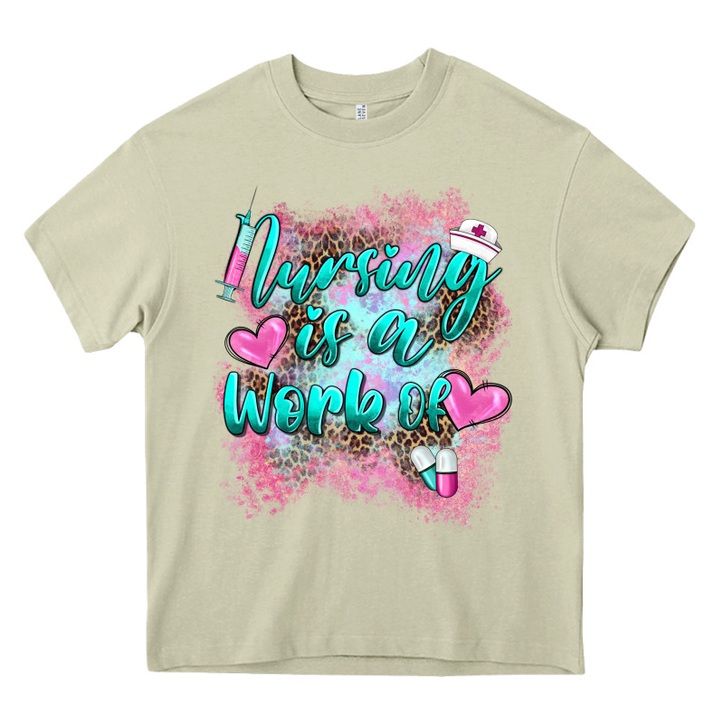 Nursing Is A Work Of Heavy Core Tee by BarkalooDesign | Teevron