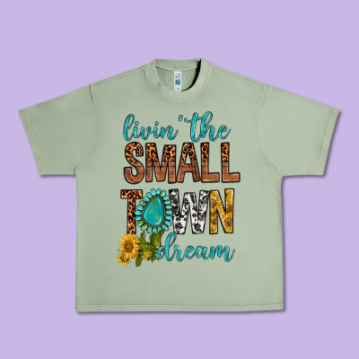 Living The Small Town Dream Urban Heavy Tee Designed By Bundleandbundleshop
