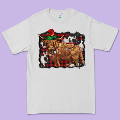 Christmas Highland Cow Premium Tee Designed By Barkaloodesign