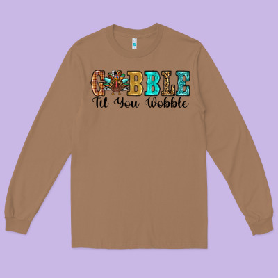 Gobble Til You Wobble Thanksgiving Turkey Long Sleeve Tee Designed By Ranaportraitstore