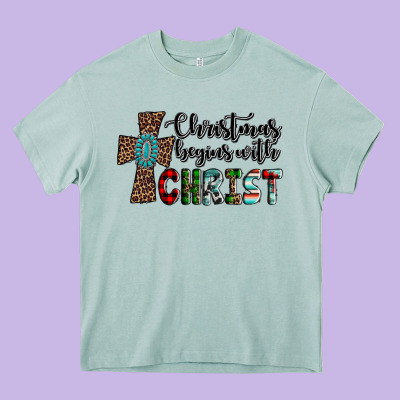 Christmas Begins With Christ Heavy Core Tee Designed By Adodesignshop