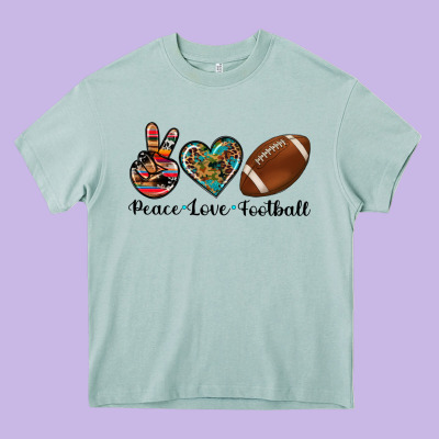 Peace Love Football Heavy Core Tee Designed By Artiststas