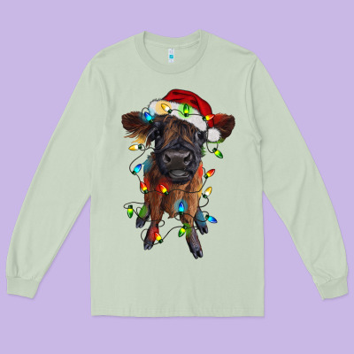 Highland Cow Calf With Christmas Lights Long Sleeve Tee Designed By Ranaportraitstore
