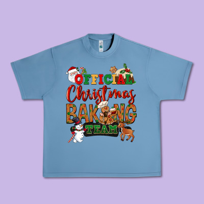 Official Christmas Baking Team Urban Heavy Tee Designed By Nancycooperartshop