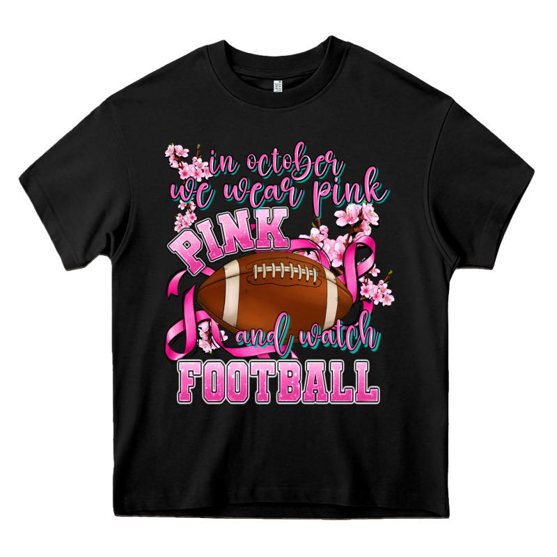 In October We Wear Pink And Watch Football Heavy Core Tee by AdoDesignShop | Teevron