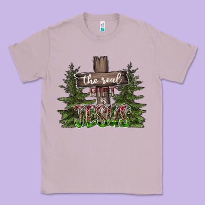 The Real Gift Is Jesus Classic Tee Designed By Cowhidedigitalart