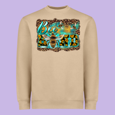 Bee Kind With Sunflower And Leopard Background Heavyweight Sweatshirt Designed By Artiststas