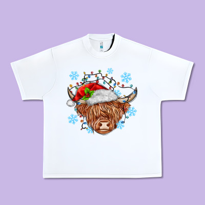 Christmas Cow Urban Heavy Tee Designed By Maliassmallbusiness
