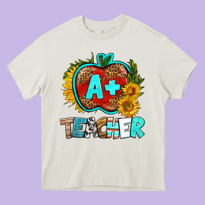A+ Teacher Apple Heavy Core Tee Designed By Bundleandbundleshop