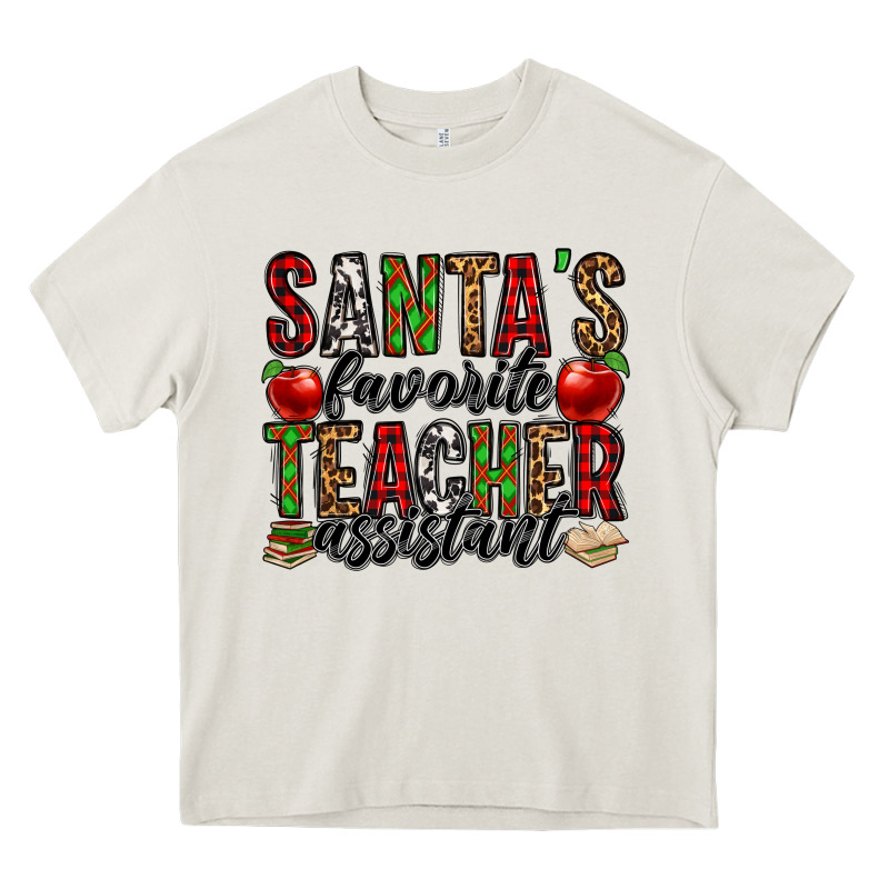 Santa's Favorite Teacher Assistant Heavy Core Tee by Jasminsmagicworld | Teevron