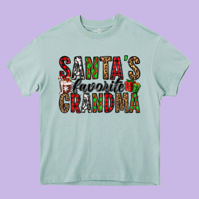 Santa's Favorite Grandma Heavy Core Tee Designed By Jasminsmagicworld