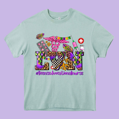 Mardi Gras  Lvn Licensed Vocational Nurse Heavy Core Tee Designed By Adodesignshop