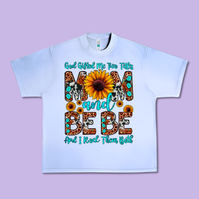 God Gifted Me Two Titles Mom And Bebe  And I Rock Urban Heavy Tee Designed By Jahusdesignshop