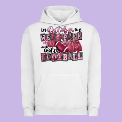 In October We Wear Pink And Watch Football Urban Hoodie Designed By Fadigitalartstudio