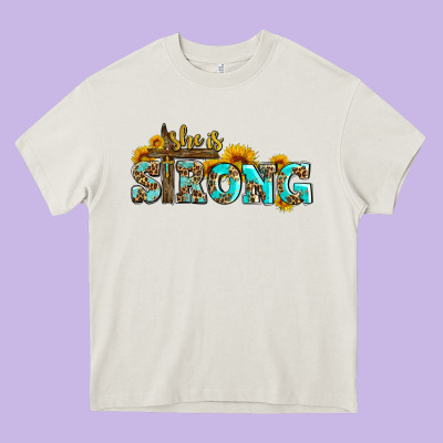 She Is Strong With Cross Heavy Core Tee Designed By Adodesignshop