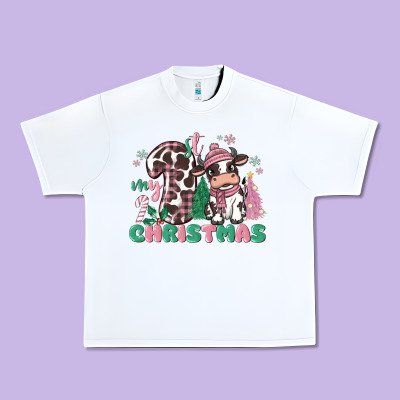 My First Christmas Cow Urban Heavy Tee Designed By Maliassmallbusiness