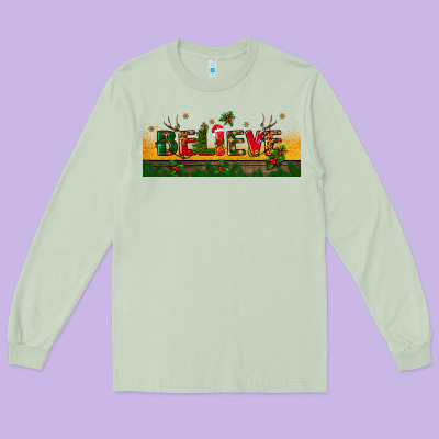 Christmas Believe Long Sleeve Tee Designed By Bundleandbundleshop
