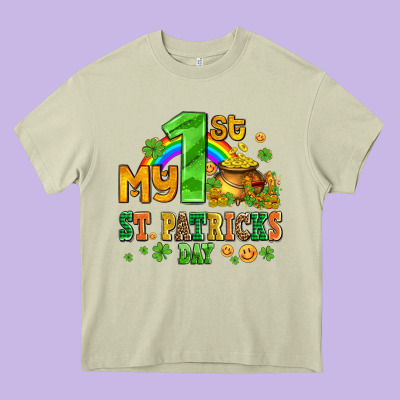 My First St Patricks Day With Coins And Shamrocks Heavy Core Tee Designed By Adodesignshop