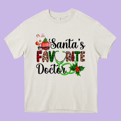 Santa's Favorite Doctor Heavy Core Tee Designed By Adodesignshop