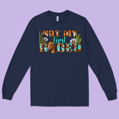 Not My First Rodeo Western Long Sleeve Tee Designed By Bundleandbundleshop