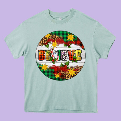 Christmas Believe Heavy Core Tee Designed By Artiststas