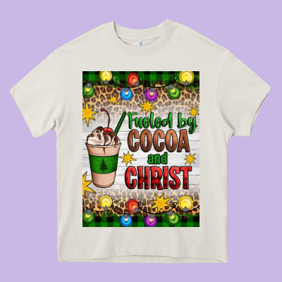 Christmas Fueled By Cocoa And Christ Heavy Core Tee Designed By Artiststas