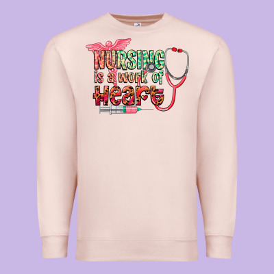 Nursing Is A Work Of Heart Premium Sweatshirt Designed By Cowgirlartshop
