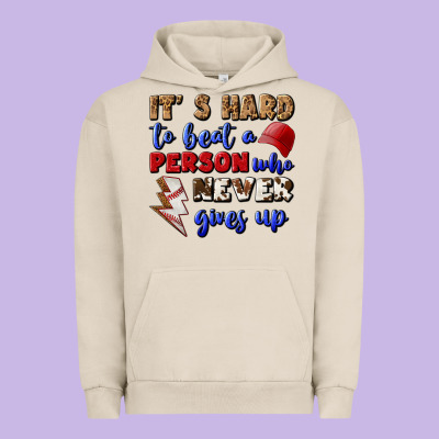 It's Hard To Beat A Person Who Never Gives Up Urban Hoodie Designed By Bundleandbundleshop