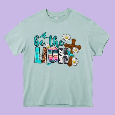 Be The Light Heavy Core Tee Designed By Adodesignshop