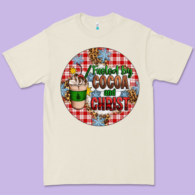 Christmas Fueled By Cocoa And Christ Ornament Premium Tee Designed By Artiststas
