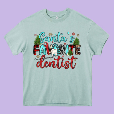 Santas Favorite Dentist Heavy Core Tee Designed By Jahusdesignshop