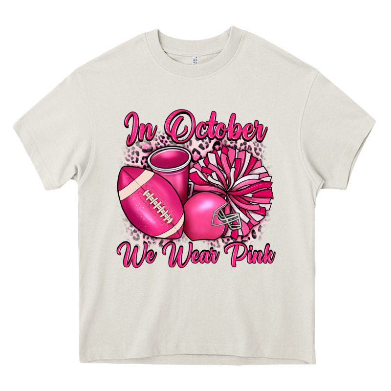 In October We Wear Pink Cheer With Football Breast Heavy Core Tee by JahusDesignShop | Teevron