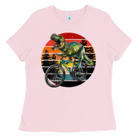 Bubblegum Pink t rex dinosaur riding bicycle with retro forest sunset Ladies Tee - RanaPortraitStore