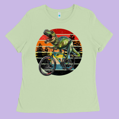 T Rex Dinosaur Riding Bicycle With Retro Forest Sunset Ladies Tee Designed By Ranaportraitstore